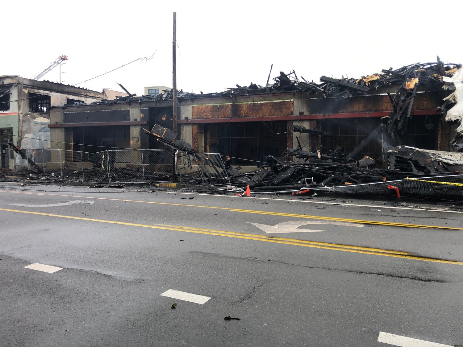 This is what remains of the five-story Market Flats apartment building, under construction at the corner of Capitol Way and Olympia Ave. in downtown Olympia following the fire on Dec. 15, 2021.