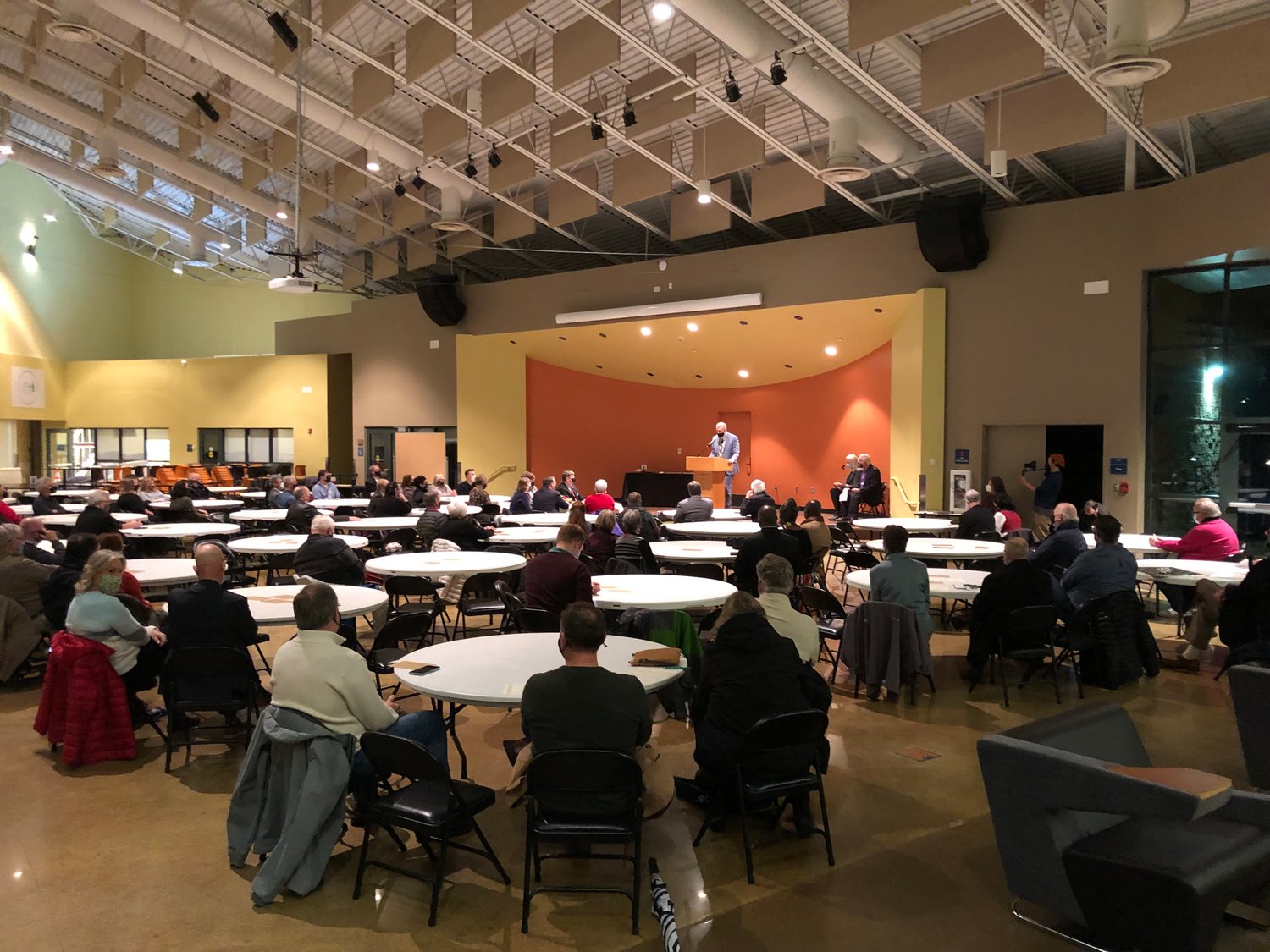 Social-distancing requirements spread apart most of the approximately 120 people who attended the retirement event for Tumwater Mayor Pete Kmet on Dec. 15, 2021.