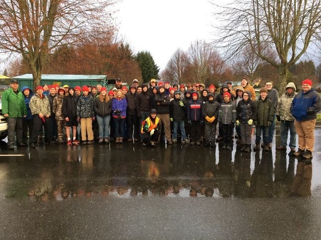Scouts and adult members of BSA Troop 222 are shown as they assembled for a day of Christmas-tree collection in 2019.