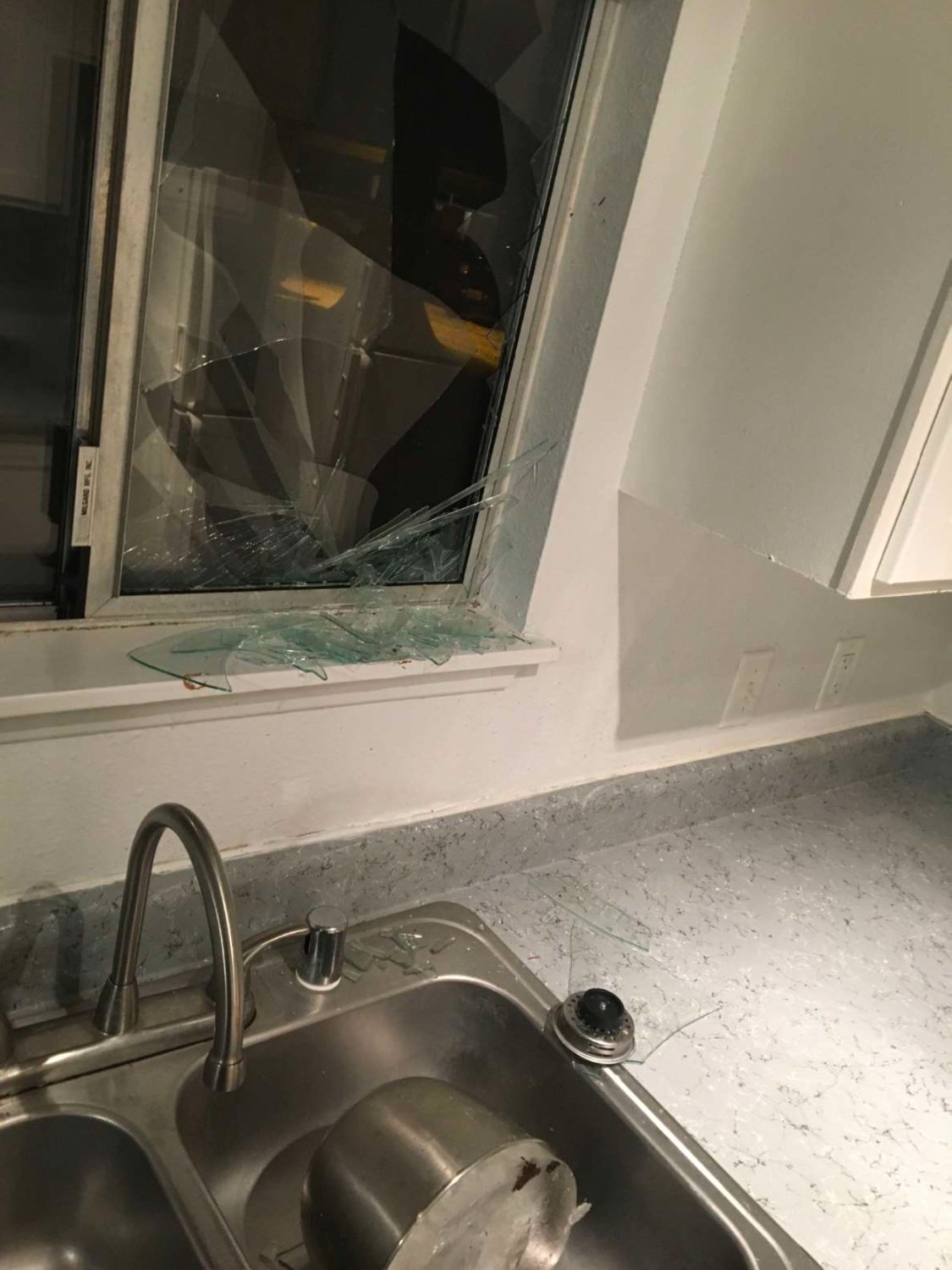 A window in the couple’s home was damaged in the incident on New Year's Eve.