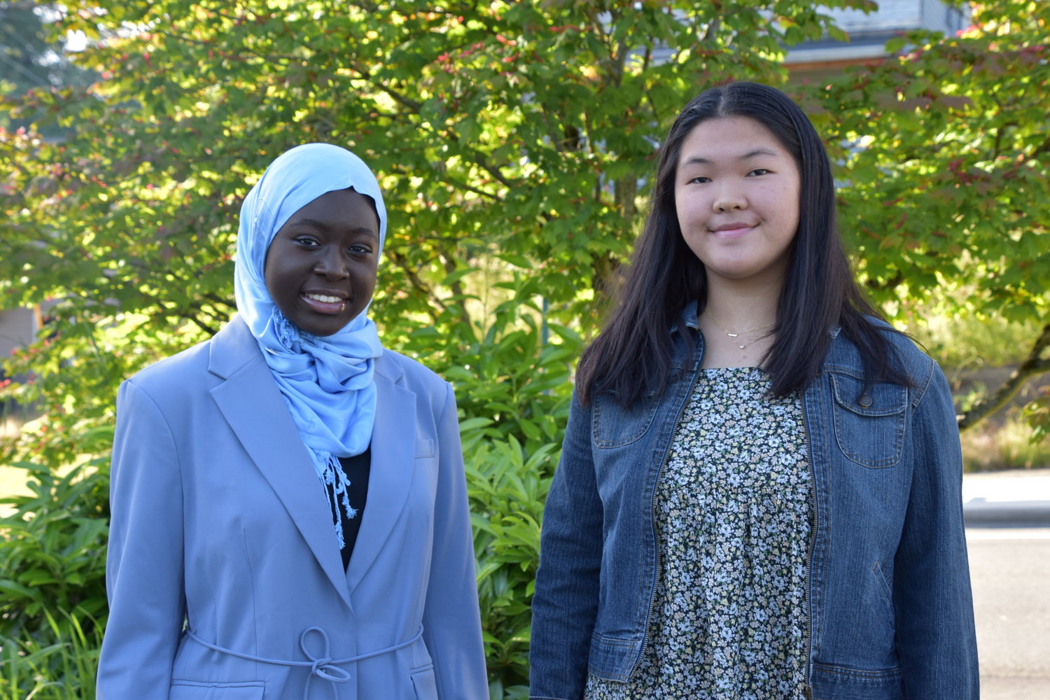 Rahma Gaye of Capitol High School (left) and Olympia High School’s Christine Zhang (right).