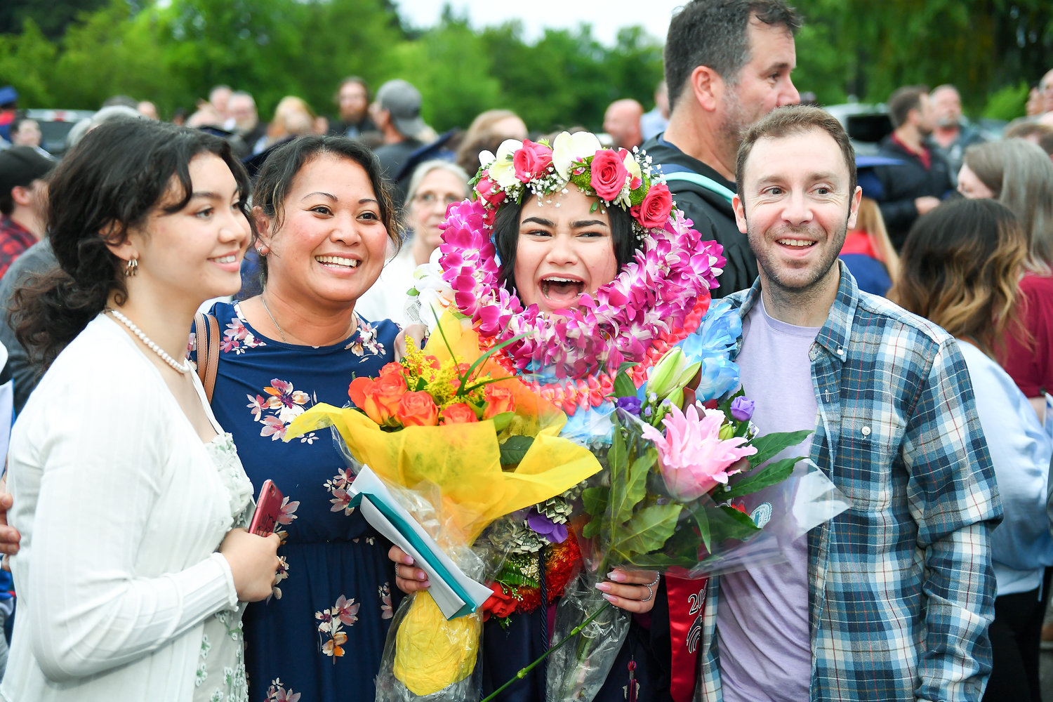 A family showers their graduate.