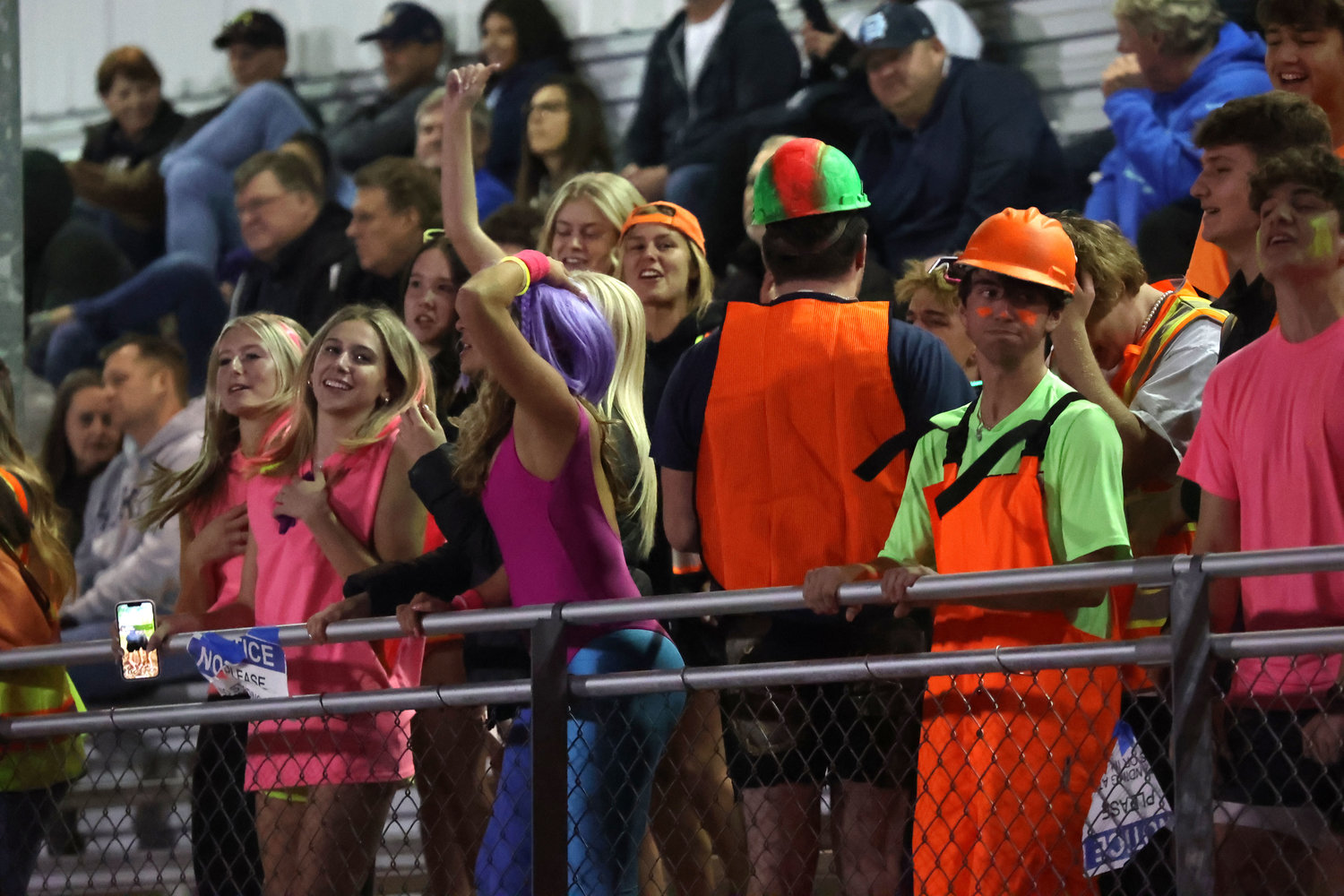 Gig Harbor "construction worker" fans show their joy at their team's victory.