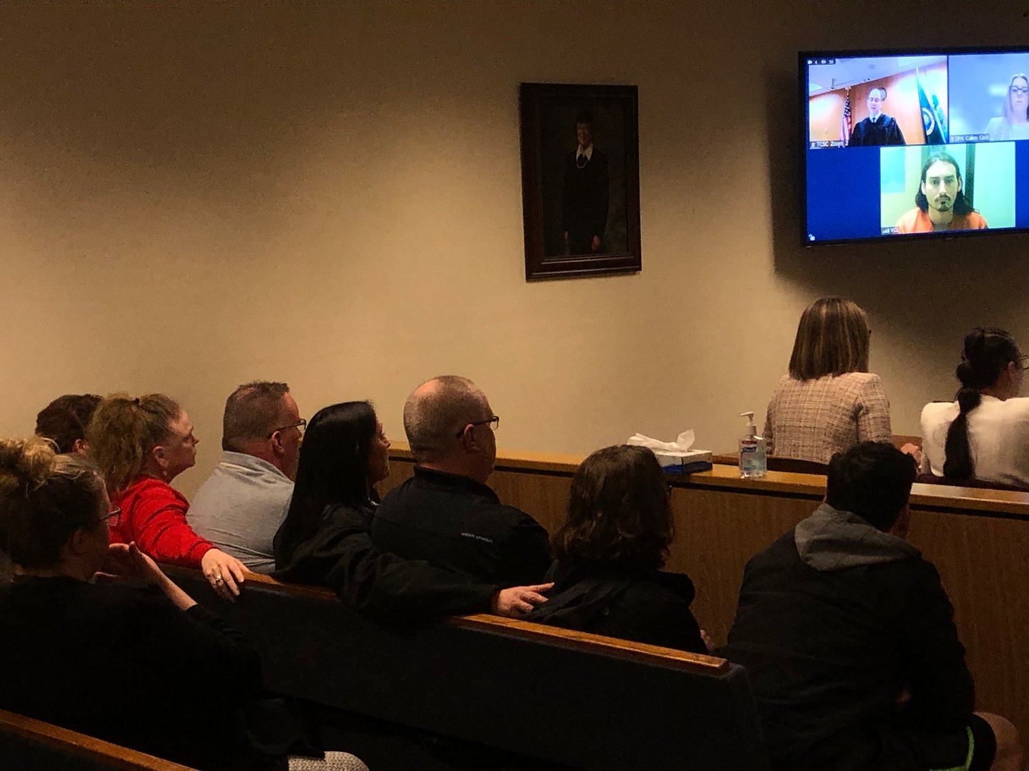 Members of the family of the infant prosecutors say was murdered appeared at the bail hearing for Eric Richard Boudreau on March 24, 2023. The defendant appears in the lower image on the video screen.